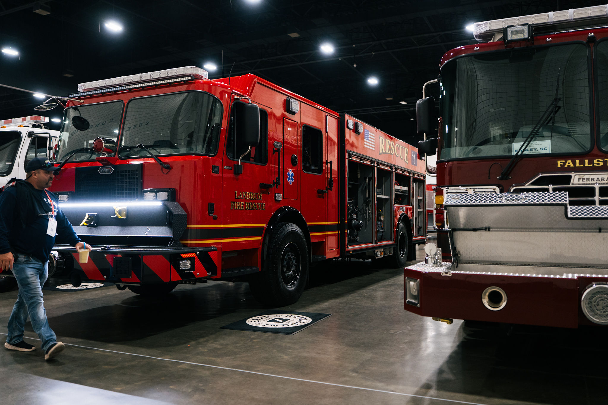 New fire apparatus lined up on a show floor